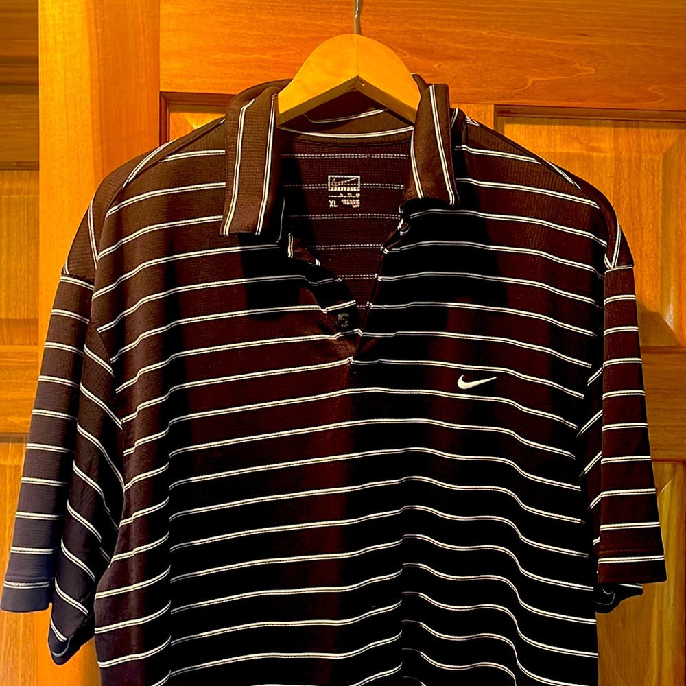 Black and white Nike golf shirt. Great shape!
